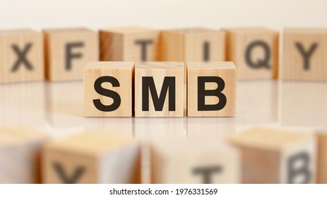 Three Toy Wood Blocks With Letters Smb On A Table With Light Background, Selective Focus. SMB - Short For Server Message Block