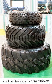 Three Tractor Tyre Covers Separately. Big Truck Or Tractor Wheel A Black Tires Closeup