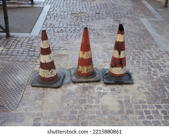 Three Traffic Cones To Mark Road Works Or Temporary Obstruction Traffic Sign