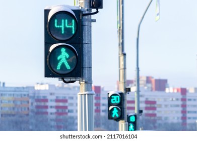 Three Traffic Lights For Pedestrians Show The Time Left To Cross The Road. High Quality Photo