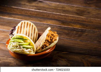 Three Types Of Arepas, Latin American Food On Wood Table