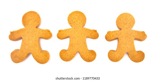 Three Undecorated Gingerbread People On A White Background