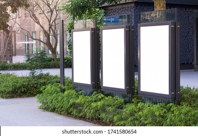 Three Vertical Billboards In The City Near The Road