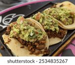 Three Very Large Pork Tacos with Guacamole