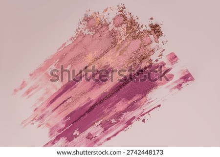 Three vibrant eyeshade samples on the beige background. Top view. make-up. closeup