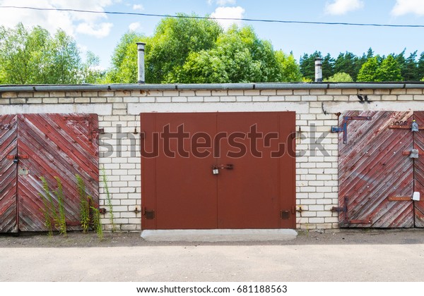 Three Vintage Woodend Old Garage Doors Stock Photo Edit Now