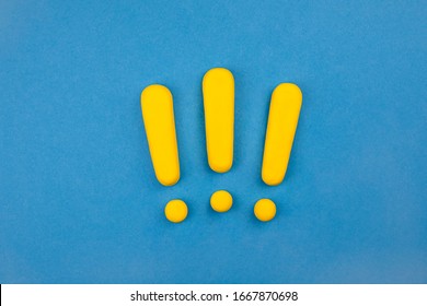 Three vivid exclamation marks on blue background.  Keep attention concept,  importance background, warning. - Shutterstock ID 1667870698