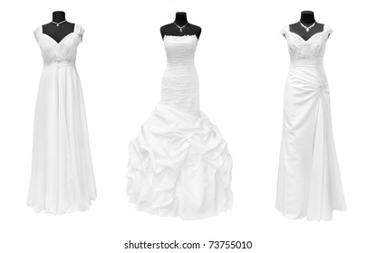 three wedding dresses isolated on white