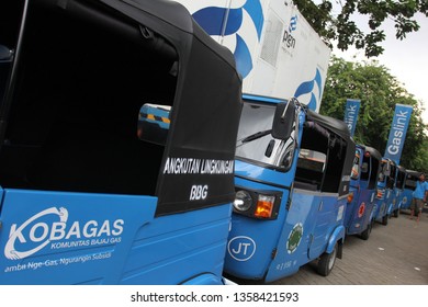 Three Wheel Taxi Or Known As Bajaj CNG At CNG Fuel Station, Monas Square, Jakarta, October 1 2014.