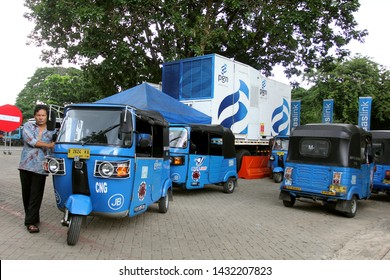 Three Wheel Taxi Or Known As Bajaj CNG At CNG Fuel Station, Monas Square, Jakarta, October 1 2014.