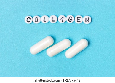 Three white capsules and a collagen inscription on a blue background, a view from above