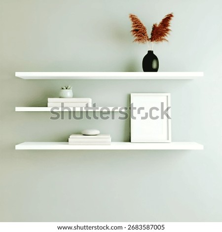 Three white floating shelves stand on a light mint green wall, without shadows. On the shelves are small potted plants, books, an empty white picture frame, and a black vase with brown grass.
