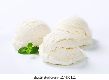 Three white ice cream scoops 