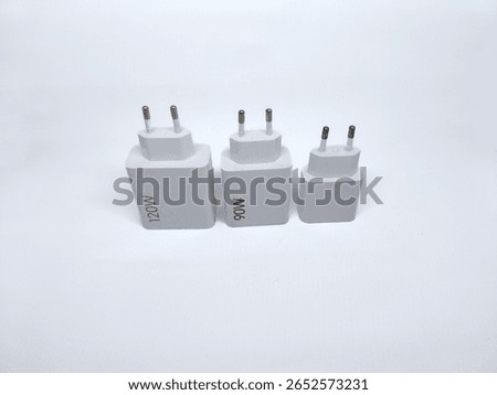 Three white power adapters with different wattage ratings (120W, 90W, and blank) arranged on white background. Ideal for electronics or charging accessories themes.
