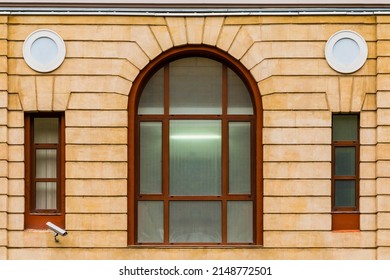 Three windows in a row on the facade of the modern urban apartment building front view, Krasnaya Polyana, Sochi, Krasnodar Krai, Russia