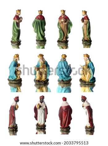 The three wise men. Ceramic figures isolated on white background