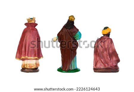 The three wise men. Ceramic figures isolated on white background 