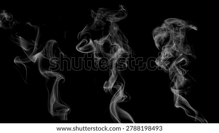 Three wisps of white smoke rising and swirling against a stark black background, abstract and ethereal