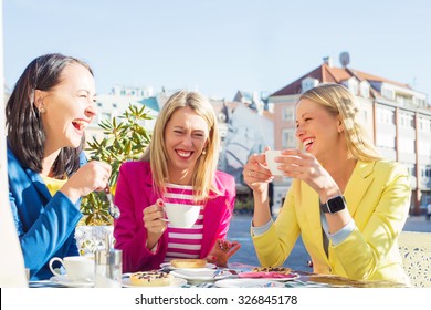 Three Women Laughing 