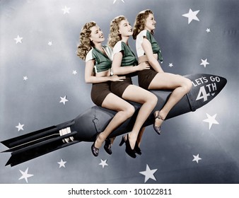 Three Women Sitting On A Rocket