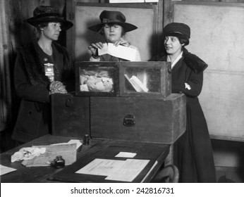Three women's suffragists casting votes in New York City, ca. 1917