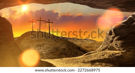 Three wooden crosses on a hill in the morning. Concept of Crucifixion on Mount Golgotha, resurrection of Jesus Christ. Christian Easter holiday symbol, Calvary. Blurred background, blur scene