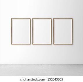 Three Wooden Frames On Wall