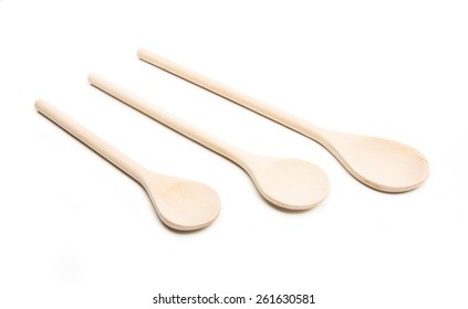 Three Wooden Spoons Isolated At White -  Small, Medium, Large