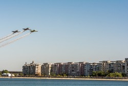 Three Yak-52 Over The City