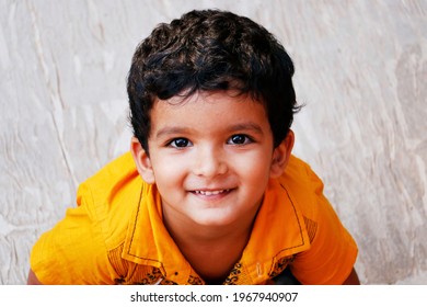 Three Year Age Indian Baby Boy In Yellow Shirt Close Up