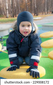 Three Year Old Boy On The Playground