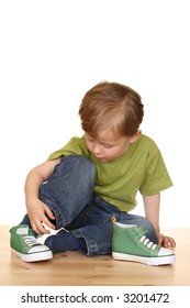 1,336 Boy putting on shoes Images, Stock Photos & Vectors | Shutterstock