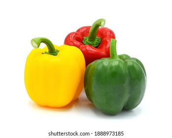 Three Yellow, Red, Green Bell peppers isolated on white background.