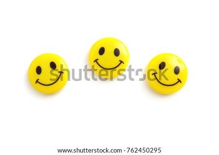 three yellow smile faces