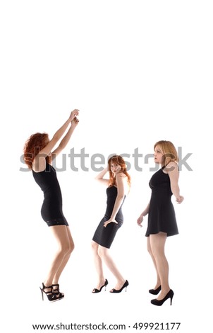 Three young attractive fashionable women - isolated white - studio shot - copy space