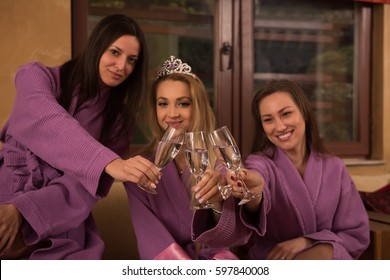 Three Young Beautiful Happy Girls Have A Bachelor Party At A Luxury Spa With Champagne