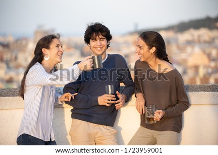 Similar – Image, Stock Photo Group of young people having fun in summer party
