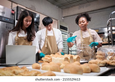 Three Young Friends And Startup Partners Of Bread Dough And Pastry Foods Busy With Homemade Baking Jobs While Cooking Orders Online, Packing, And Delivering On Bakery Shop, Small Business Entrepreneur