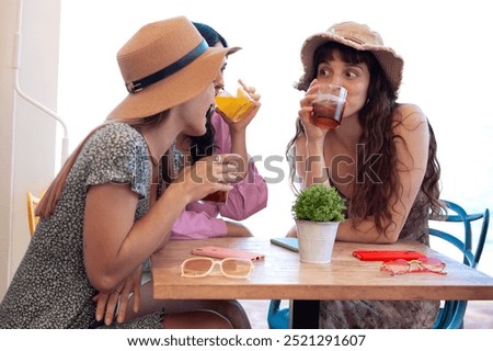 Similar – Young women couple drinking healthy drinks outdoors