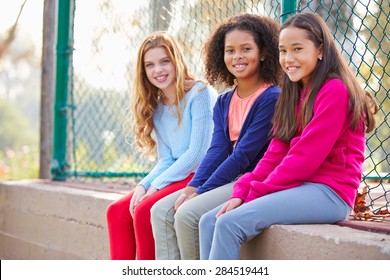 Three Young Girls Hanging Out Together In Park - Shutterstock ID 284519441