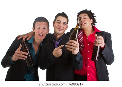 Three young men with business outfit with beer isolated over white.