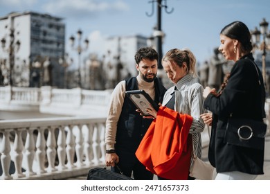 Three young professionals are analyzing data on a clipboard during an outdoor business meeting in a city setting.