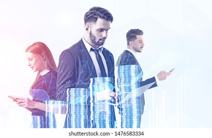 Three Young Traders Working With Gadgets Over White Background With Double Exposure Of Digital Graphs And Stacks Of Coins. Concept Of Teamwork And Stock Market. Toned Image