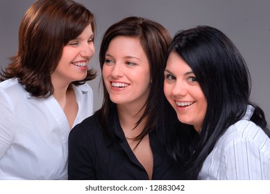 Three Young Women Talking And Having Fun