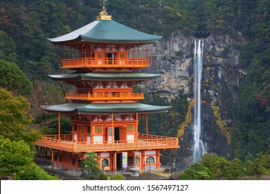 Three-story pagoda with the Nachi Falls (Nachi-no-taki,) in the background. Wakayama Prefecture, Japan.