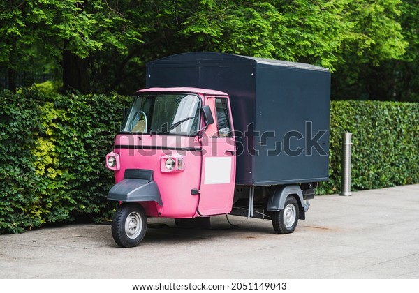 Three-wheeled Light Commercial Vehicle food\
truck coffee mobile shop mock up\
sign.\
\
