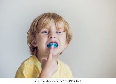 Three-year Old Boy Shows Myofunctional Trainer To Illuminate Mouth Breathing Habit. Helps Equalize The Growing Teeth And Correct Bite. Corrects The Position Of The Tongue