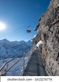 The Thrill Walk at Birg in the Swiss Alps. The steel structure hugs the cliff side and there is a vertical drop beneath. The views of the mountains are stunning. Not for the faint hearted.