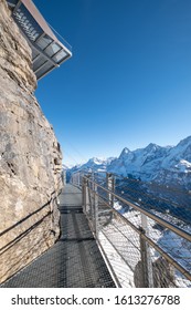 The Thrill Walk at Birg in the Swiss Alps. The steel structure hugs the cliff side and there is a vertical drop beneath. The views of the mountains are stunning. Not for the faint hearted.