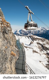 The Thrill Walk at Birg in the Swiss Alps. The steel structure hugs the cliff side and there is a vertical drop beneath. The views of the mountains are stunning. Not for the faint hearted.